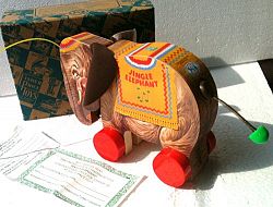 FISHER PRICE Wooden Pull Toy JINGLE ELEPHANT from Toy Town U. S. A. 1993 LIMITED NUMBERED EDITION Collectible (6" Tall)