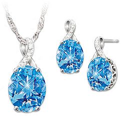 Summer Breeze Sterling Silver Pendant Necklace And Earrings Set Featuring Over 2.5 Carats Of Oval-Shaped Swiss Blue Topaz & Accented With Diamonds