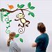 Little Monkey Grabbing a Tree Branch Vinyl Wall Decal for Kids and Nursery Room by KiKi Monkey