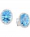 Blue Topaz (4-3/8 ct. t. w. ) & Diamond (1/6 ct. t. w. ) Halo Stud Earrings in 14k White Gold
