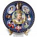Queen Elizabeth II Heirloom Porcelain Collector Plate Adorned With 22K Gold Accents Featuring A Full-Colour Montage Of 9 Photo Portraits Of Her Majesty