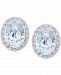 Aquamarine (1-1/3 ct. t. w. ) and Diamond (1/10 ct. t. w. ) Halo Stud Earrings in 14k White Gold