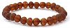 Raw Baltic Amber Stretch Bracelet - Suitable for Most Adults (Men and Women) - Size 7 inches (18 cm) - Made on Elastic Band - Unpolished Amber Beads - BoutiqueAmber (7 inches, Cognac)