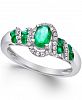 Precious Gemstone (7/8 ct. t. w. ) and Diamond (1/6 ct. t. w. ) Twist Ring in Sterling Silver (in Ruby or Emerald)